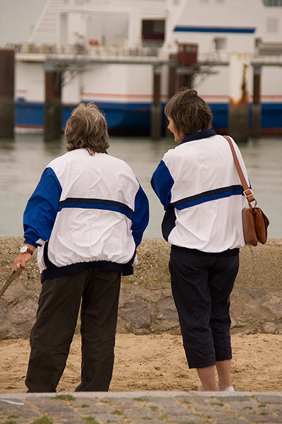 Big Picture: Couples: A couple dressed in matching white and blue jackets