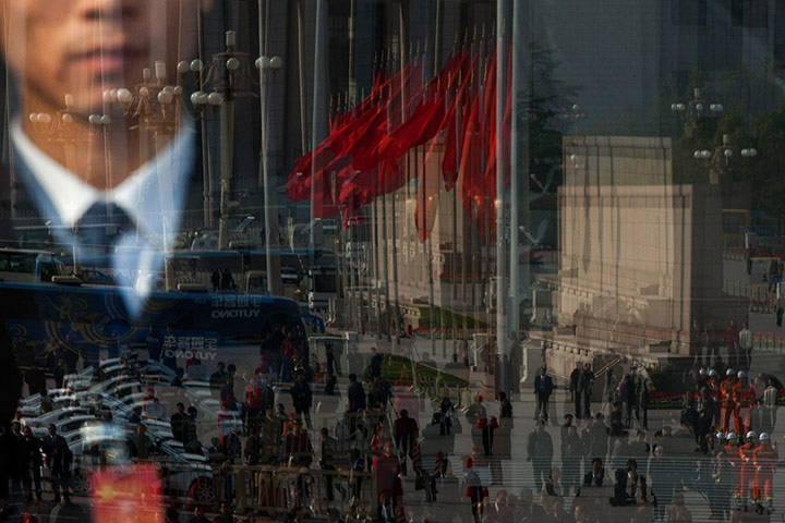 China national congress: A reflection in a glass door of the Great Hall of the People