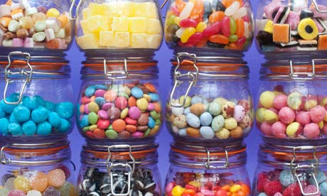 Colourful assorted childrens sweets and candy in jars