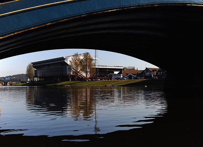 Joy of six stadiums: Craven Cottage from across The River Thames