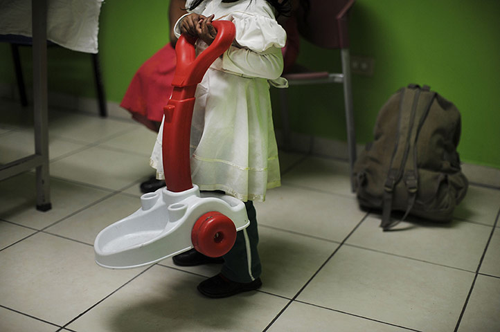 24 Hours: A patient waits for care in a room in a hospital in El Salvador