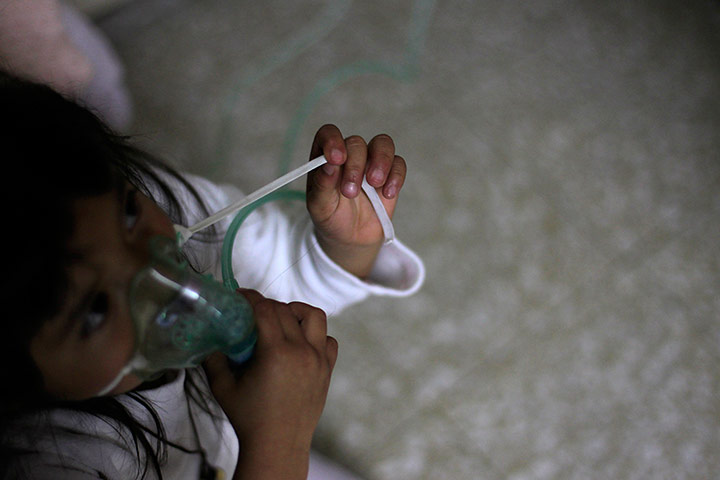 24 Hours: A child receives inhalotherapy in the San Jose Hospice in Guatemala City