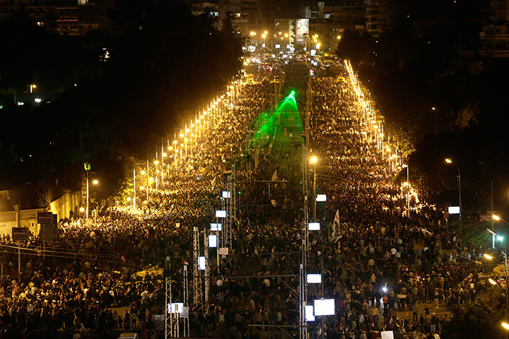 Egypt protests: Protesters gather outside the presidential palace after braking through