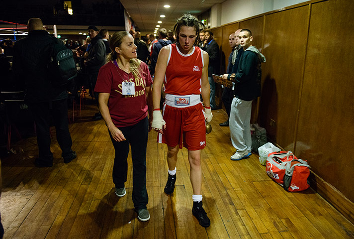 Lucy Fry gallery: An exhausted Lucy is congratulated by her trainer 