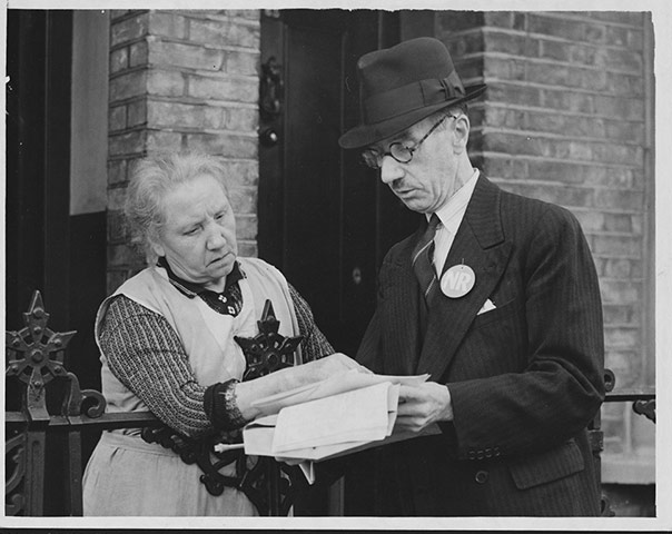 UK census: An Enumerator Explains a Census Form to Elderly Woman, 1939
