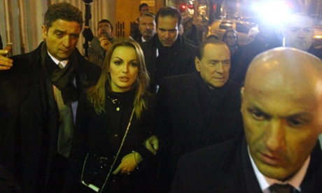 Berlusconi with Francesca Pascale – said to be his girlfriend – in Milan earlier on Sunday.