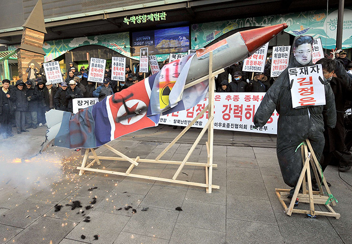 North Korea missile: South Korean conservative activists set fire to a mock North Korean missile