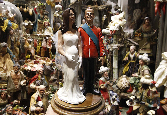 A lighter look: A figurine of Prince William and Catherine on sale in Naples, Italy