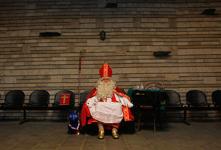 A lighter look: Saint Nicholas waits for children in Brussels