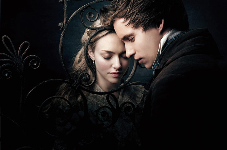 Golden Globes: Amanda Seyfried & Eddie Redmayne in Les Miserables film still
