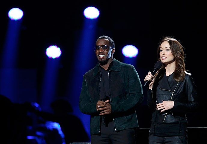 Sandy gig: Sean Combs and actress Olivia Wilde