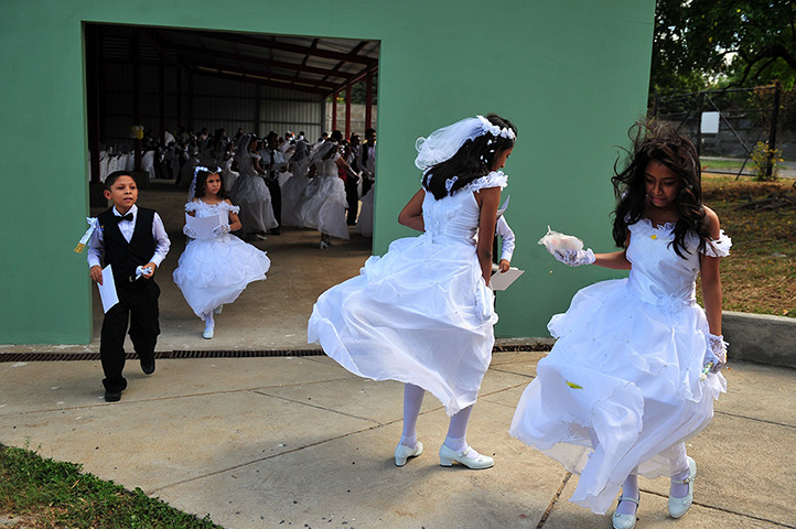 24 hours: Managua, Nicaragua: Girls after their first communion