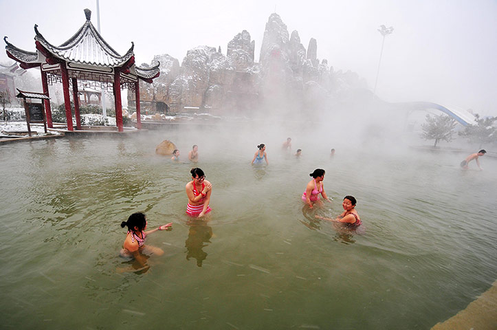 24 hours: Hebei province, China: People soak in the hot spring in Xingtai