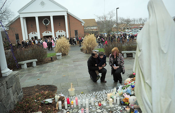 Sandy Hook: Parishioners pay their respects to victims of the shooting