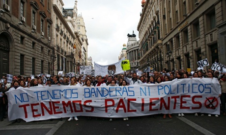 Health workers march against austerity measures in Madrid, 16 December  2012. 