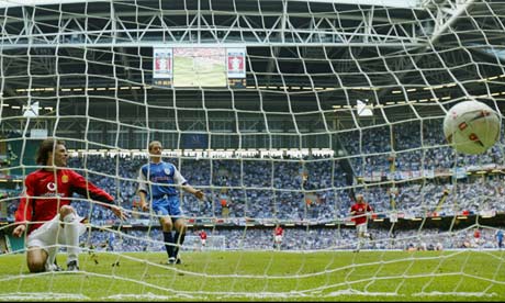 footballer scores a goal