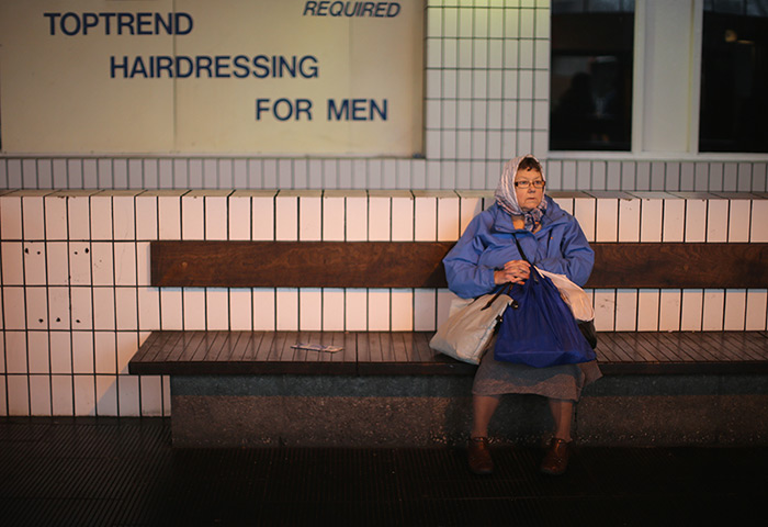 24 hours in pictures: A traveller waits for their bus connection at Preston Bus Station