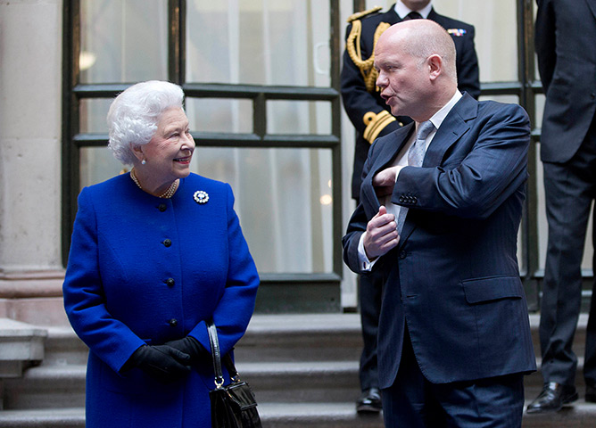 Lighter look: Queen Elizabeth II with Foreign Secretary William Hague