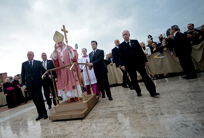 Lighter look: Pope Benedict XVI arrives for a visit 