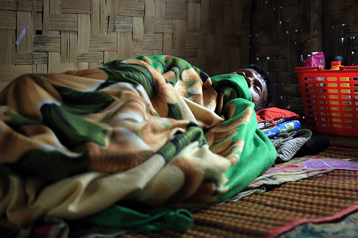 24 Hours: Rangoon, Burma: A man with HIV rests in a hospice