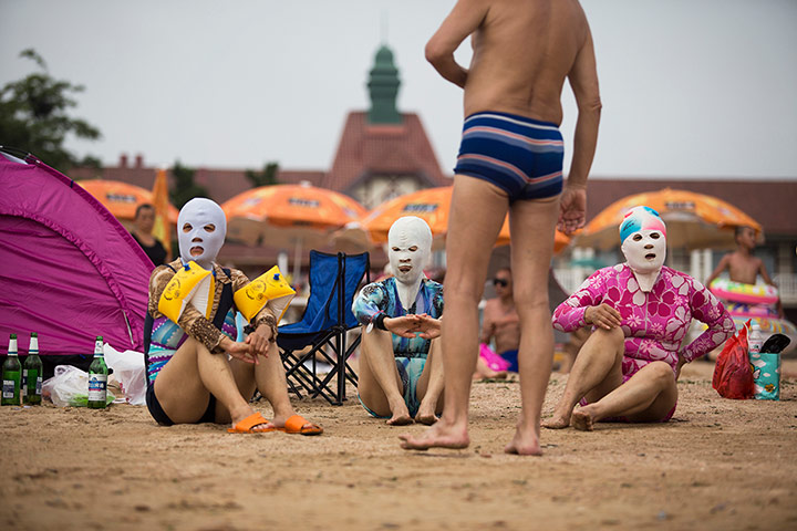 Pics of the Year 2012: The masked women by Chi Yin Sim