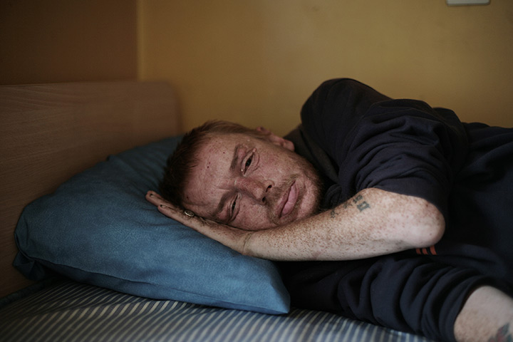 Portraits of 2012: Jo Milligan in his room at the hostel 
