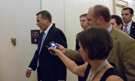 Speaker John Boehner leaves a House Republicans meeting