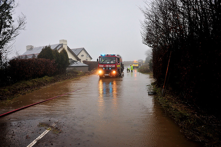 Wet weather: Fire and Rescue services work to clear a section of the A399 in north Devon