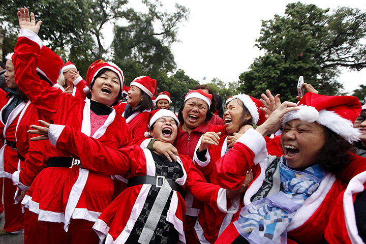24 hours: Hanoi, Vietnam: Members of a Laughter Yoga club 