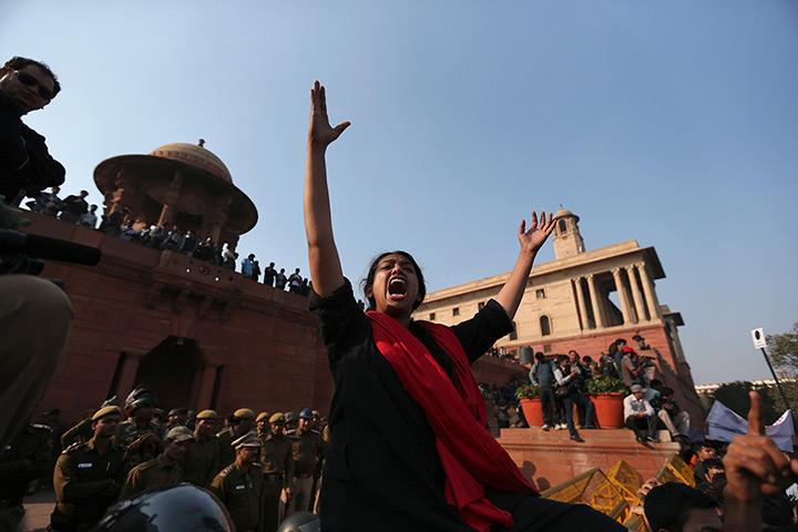 24 hours: New Delhi, India: A demonstrator shouts slogans 