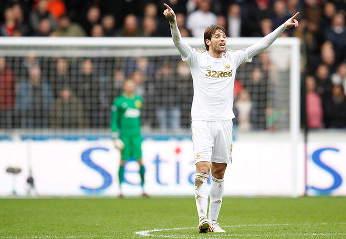 Sunday Action Roundup: Swansea City's Michu celebrates after scoring their first goal