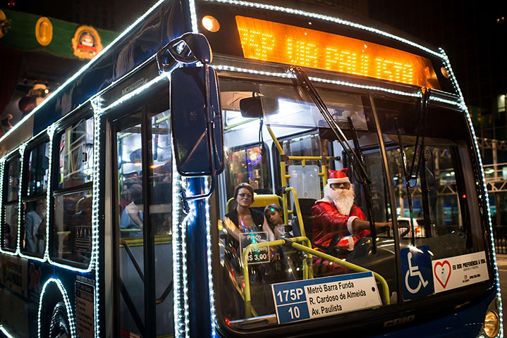 Global Santa Claus : Santa Claus drives a bus