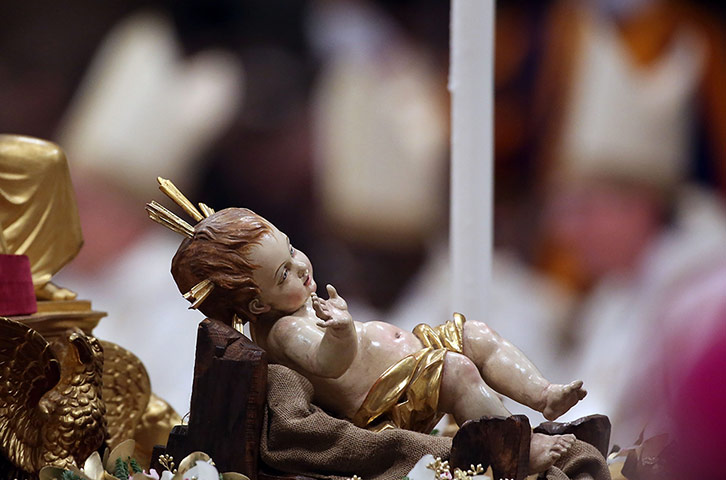 24 hours in pictures: Pope Benedict XVI Celebrates Christmas Night Mass