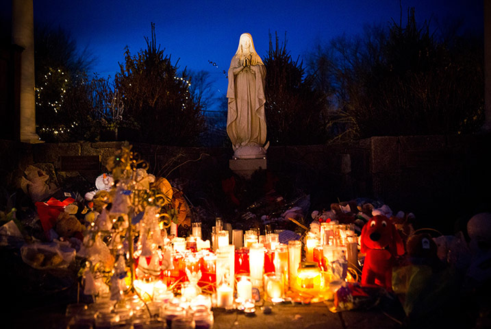 24 hours in pictures: Candles left as a memorial