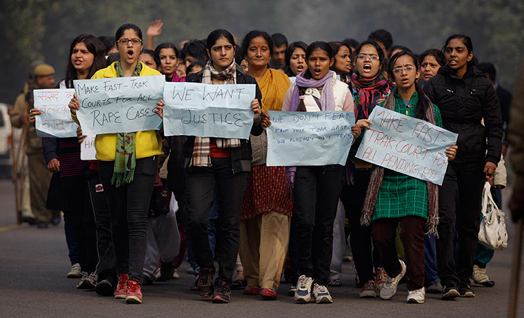 24 hours in pictures: Indian protesters hold placards