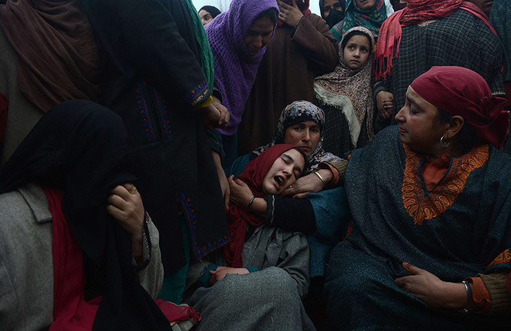 20 Photos: Kashmiri muslim woman mourn during the funeral of Lashkar-e-Toiba militant