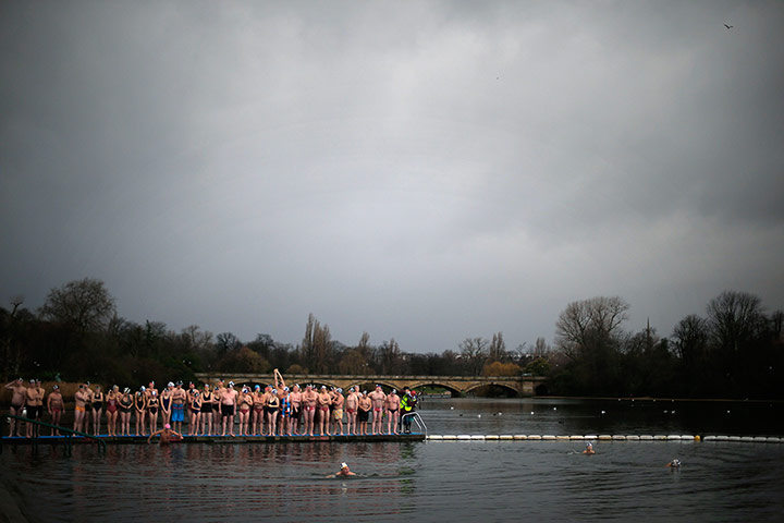 20 Photos: Members of Serpentine swimming club before the Christmas Day race in London