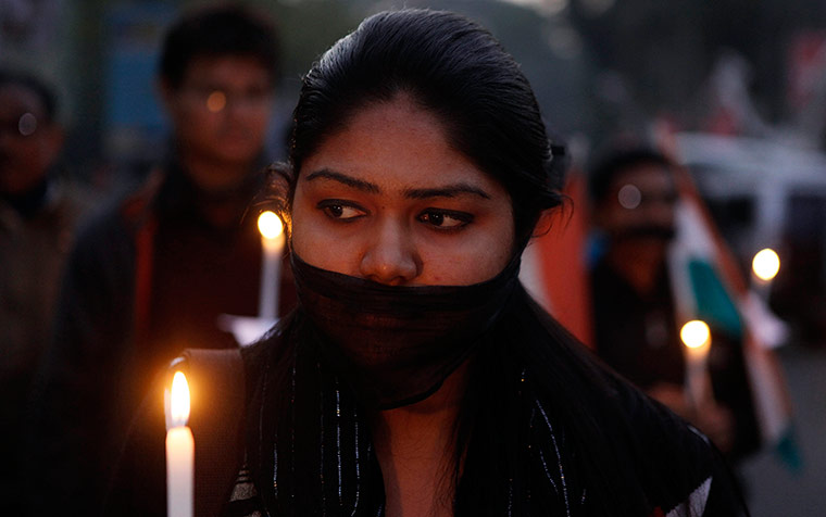 India: An Indian woman participates in a silent procession