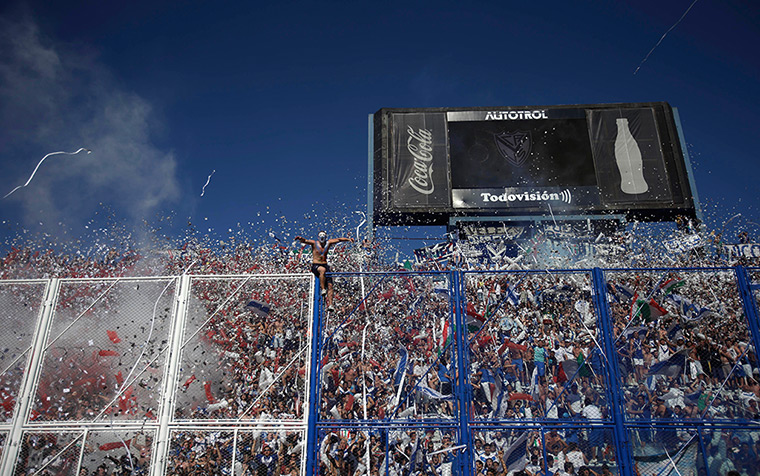 24 hours in pictures: Velez Sarsfield's fans cheer their team 