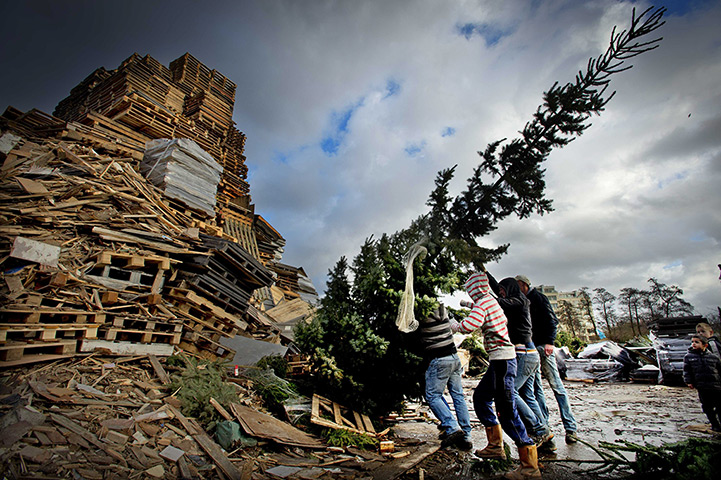 24 hours: Vlaardingen, The Netherlands: A group of youths prepare a bonfire