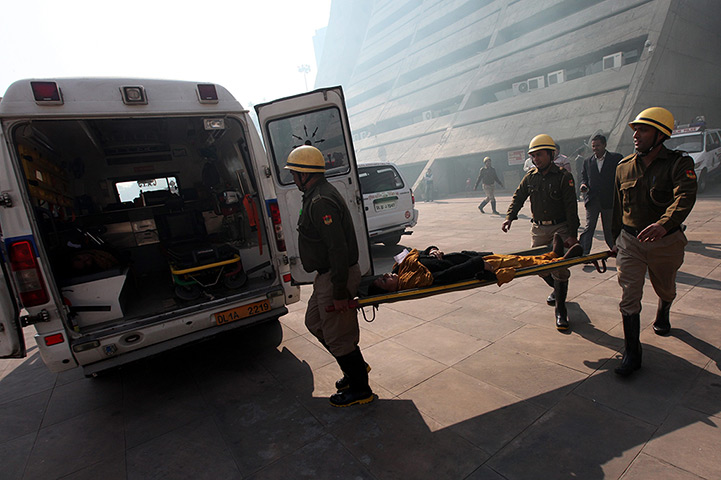 24 hours: New Delhi, India: Rescue workers conduct mock drill