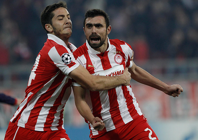 tuesday matchday 6 3: Olympiakos' Giannis Maniatis celebrates 