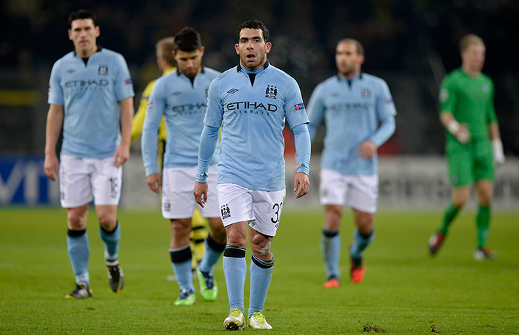 tuesday matchday 6 4: Carlos Tevez and team-mates trudge off the pitch