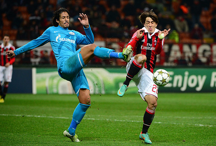 tuesday matchday 6 4: Milan's Bojan Krkic attempts to block the clearance of Zenit's Bruno Alves