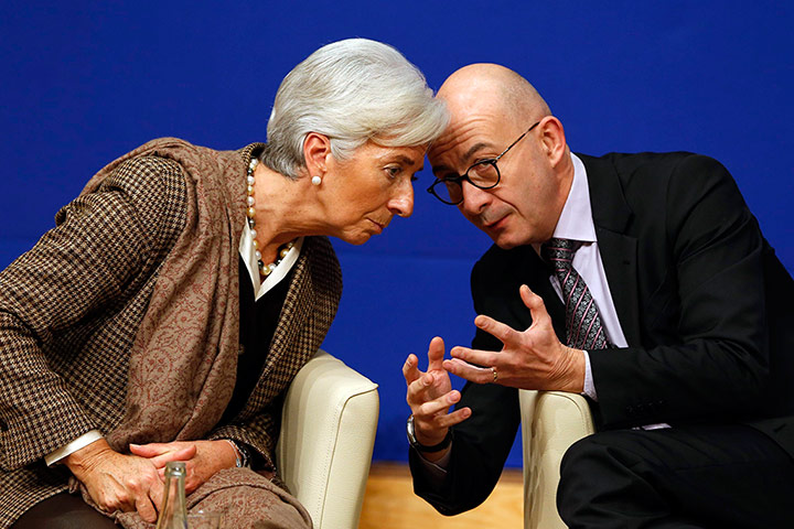 Comedy pictures: Christine Lagarde speaks with journalist Francois Lenglet in Paris