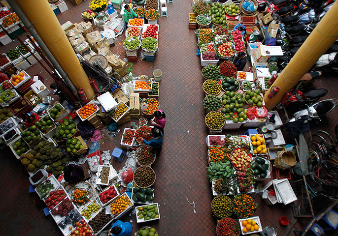 24 hours: Hanoi, Vietnam: Fruit on display at the Hom market