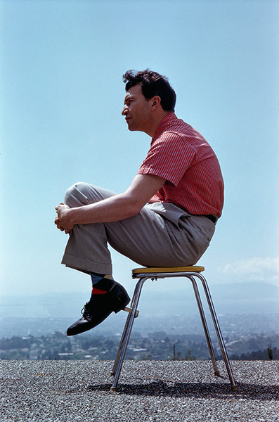 Dave Brubeck: Pianist Dave Brubeck Sitting On Stool