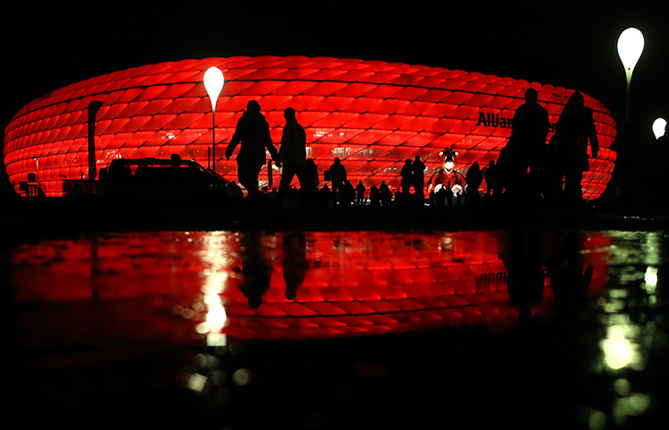 wed champ league: Fans arrive at the Allianz Arena in Munich