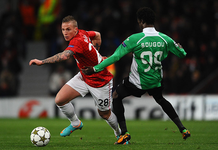 wed champ league: Alexander Buttner attempts to nip past Modou Sougou 