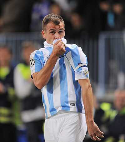 qualifiers: Sergio Duda of Malaga CF celebrates after scoring